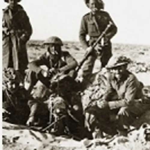 Gun pit – Sidi Rezegh airfield. Back: C.A. ‘Shorty’ Rogers, Brian Cox, John Black. Front: Laurie Daly, George Woolf, Bert Hambling.